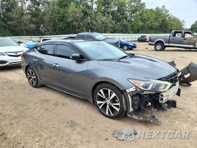 Czwarte zdjęcie samochodu z boku: 2017 NISSAN MAXIMA 3.5 S VIN:1N4AA6AP9HC417083 - miniatura