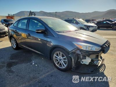 Czwarte zdjęcie samochodu z boku: 2015 FORD FOCUS SE VIN:1FADP3F22FL229896 - miniatura