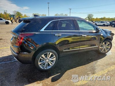 Trzecie zdjęcie samochodu z tyłu: 2024 CADILLAC XT5 PREMIUM LUXURY VIN:1GYKNDR4XRZ754372 - miniatura