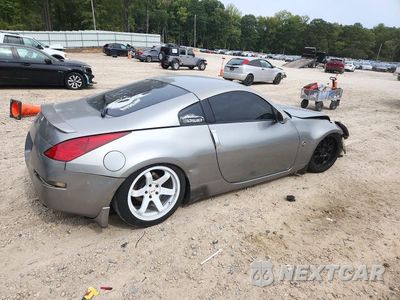 Trzecie zdjęcie samochodu z tyłu: 2004 NISSAN 350Z BASE VIN:JN1AZ34E14M154929 - miniatura