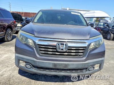 Piąte zdjęcie samochodu w środku: 2017 HONDA RIDGELINE RT VIN:5FPYK2F23HB010124 - miniatura