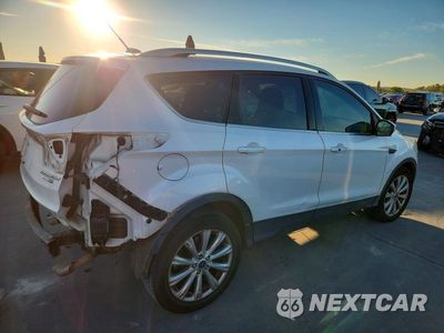 Trzecie zdjęcie samochodu z tyłu: 2017 FORD ESCAPE TITANIUM VIN:1FMCU9J92HUD21296 - miniatura