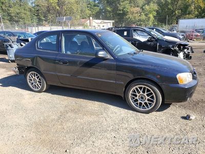 Czwarte zdjęcie samochodu z boku: 2000 HYUNDAI ACCENT GS VIN:KMHCG35G2YU056845 - miniatura