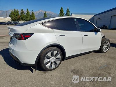 Trzecie zdjęcie samochodu z tyłu: 2022 TESLA MODEL Y VIN:7SAYGDEE8NF403262 - miniatura