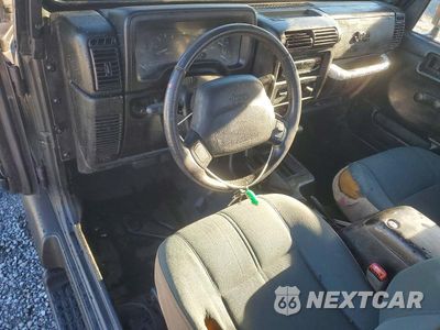 Zdjęcie 8 z 12 samochodu: 2000 JEEP WRANGLER / TJ SAHARA VIN:1J4FA59S4YP802394 - miniatura
