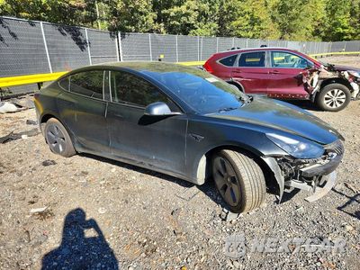 Czwarte zdjęcie samochodu z boku: 2022 TESLA MODEL 3 VIN:5YJ3E1EA4NF341853 - miniatura