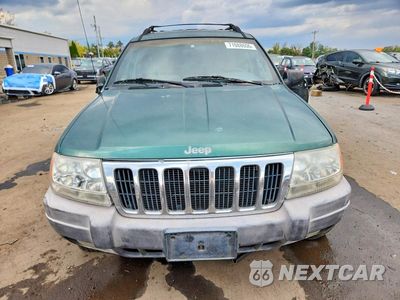 Piąte zdjęcie samochodu w środku: 1999 JEEP GRAND CHEROKEE LAREDO VIN:1J4GW58S1XC680154 - miniatura