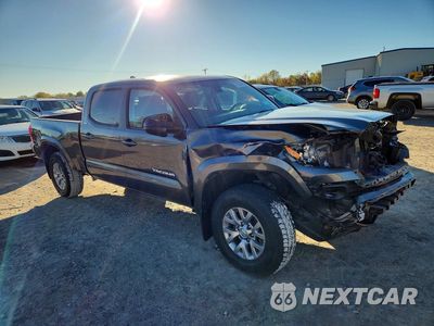 Czwarte zdjęcie samochodu z boku: 2018 TOYOTA TACOMA SR5 V6 VIN:3TMDZ5BN5JM042790 - miniatura