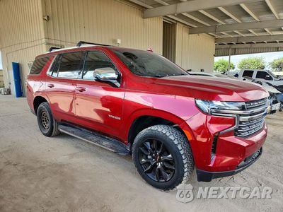 Czwarte zdjęcie samochodu z boku: 2021 CHEVROLET TAHOE C1500 PREMIER VIN:1GNSCSKD2MR138272 - miniatura