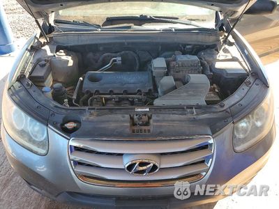 Zdjęcie 12 z 13 samochodu: 2012 HYUNDAI SANTA FE GLS VIN:5XYZGDAB6CG122449 - miniatura