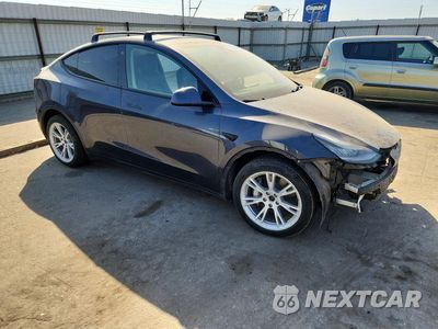 Czwarte zdjęcie samochodu z boku: 2022 TESLA MODEL Y VIN:7SAYGAEE4NF381906 - miniatura