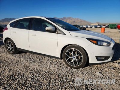 Czwarte zdjęcie samochodu z boku: 2017 FORD FOCUS SEL VIN:1FADP3M2XHL314247 - miniatura