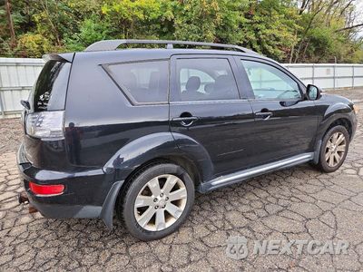 Trzecie zdjęcie samochodu z tyłu: 2011 MITSUBISHI OUTLANDER SE VIN:JA4JT3AW4BU032634 - miniatura