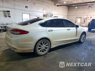 Trzecie zdjęcie samochodu z tyłu: 2017 FORD FUSION SE VIN:3FA6P0HDXHR140121 - miniatura