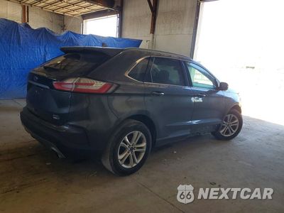 Trzecie zdjęcie samochodu z tyłu: 2020 FORD EDGE SEL VIN:2FMPK4J96LBA70694 - miniatura
