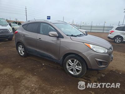 Czwarte zdjęcie samochodu z boku: 2011 HYUNDAI TUCSON GLS VIN:KM8JUCAC0BU257900 - miniatura