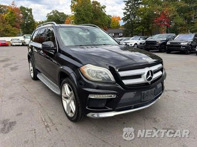 Czwarte zdjęcie samochodu z boku: 2015 MERCEDES-BENZ GL 550 4MATIC VIN:4JGDF7DE4FA511188 - miniatura
