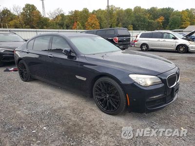 Czwarte zdjęcie samochodu z boku: 2014 BMW 740 LI VIN:WBAYE4C55ED138021 - miniatura