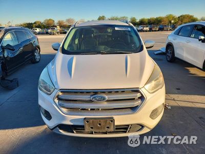 Piąte zdjęcie samochodu w środku: 2017 FORD ESCAPE TITANIUM VIN:1FMCU9J92HUD21296 - miniatura