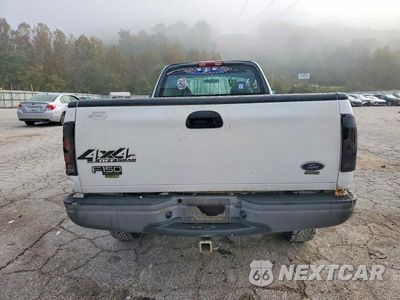 Zdjęcie 10 z 12 samochodu: 2004 FORD F-150 HERITAGE CLASSIC VIN:2FTRF18204CA31698 - miniatura