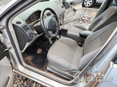 Zdjęcie 7 z 12 samochodu: 2006 FORD FOCUS ZX5 VIN:1FAFP37N16W167701 - miniatura
