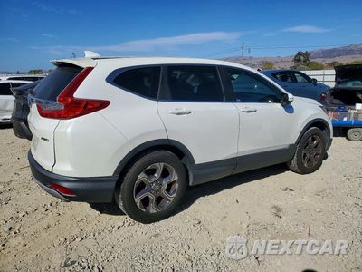Trzecie zdjęcie samochodu z tyłu: 2018 HONDA CR-V EX VIN:2HKRW2H57JH608085 - miniatura