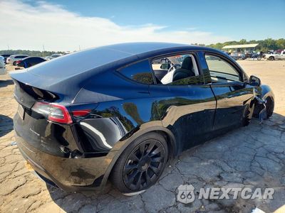 Trzecie zdjęcie samochodu z tyłu: 2022 TESLA MODEL Y VIN:7SAYGDEEXNF430026 - miniatura