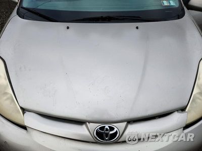 Zdjęcie 12 z 13 samochodu: 2010 TOYOTA SIENNA LE 8-PASSENGER VIN:5TDKK4CCXAS340299 - miniatura