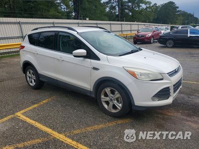 Czwarte zdjęcie samochodu z boku: 2014 FORD ESCAPE SE VIN:1FMCU0GX1EUC42103 - miniatura