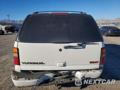 Zdjęcie 6 z 13 samochodu: 2002 GMC DENALI XL K1500 VIN:1GKFK66U92J102304 - miniatura