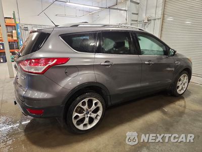 Trzecie zdjęcie samochodu z tyłu: 2014 FORD ESCAPE TITANIUM VIN:1FMCU9J93EUA74835 - miniatura