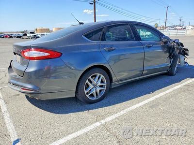 Trzecie zdjęcie samochodu z tyłu: 2016 FORD FUSION SE VIN:3FA6P0H73GR386145 - miniatura