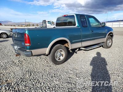 Trzecie zdjęcie samochodu z tyłu: 1997 FORD F150 VIN:1FTEX18LXVKC11630 - miniatura