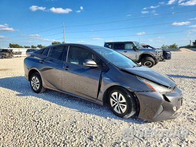 Czwarte zdjęcie samochodu z boku: 2016 TOYOTA PRIUS THREE VIN:JTDKARFUXG3001136 - miniatura