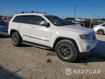 Czwarte zdjęcie samochodu z boku: 2013 JEEP GRAND CHEROKEE LAREDO VIN:1C4RJFAG4DC635035 - miniatura