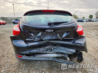 Zdjęcie 6 z 13 samochodu: 2014 FORD FOCUS TITANIUM VIN:1FADP3N20EL391736 - miniatura