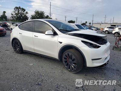 Czwarte zdjęcie samochodu z boku: 2023 TESLA MODEL Y VIN:7SAYGDEF3PF667274 - miniatura