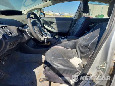 Zdjęcie 7 z 12 samochodu: 2015 TOYOTA PRIUS TWO VIN:JTDKN3DU8F0445538 - miniatura