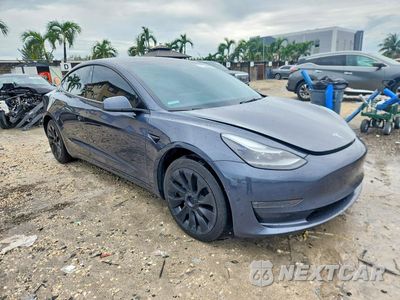 Czwarte zdjęcie samochodu z boku: 2022 TESLA MODEL 3 VIN:5YJ3E1EB1NF253075 - miniatura