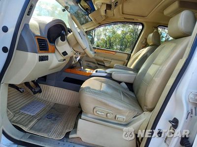 Zdjęcie 7 z 13 samochodu: 2010 INFINITI QX56 BASE VIN:5N3ZA0NE0AN908920 - miniatura