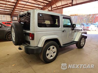 Trzecie zdjęcie samochodu z tyłu: 2012 JEEP WRANGLER SAHARA VIN:1C4GJWBG1CL105951 - miniatura