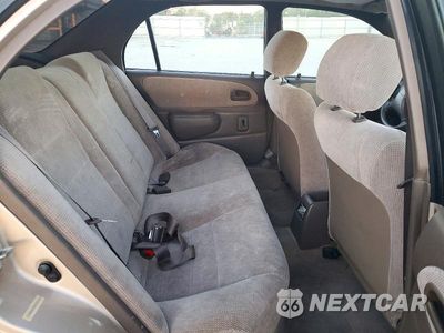 Zdjęcie 10 z 12 samochodu: 1997 TOYOTA COROLLA DX VIN:1NXBB02E8VZ509602 - miniatura