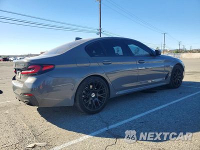 Trzecie zdjęcie samochodu z tyłu: 2021 BMW 530E VIN:WBA13AG0XMCG11570 - miniatura