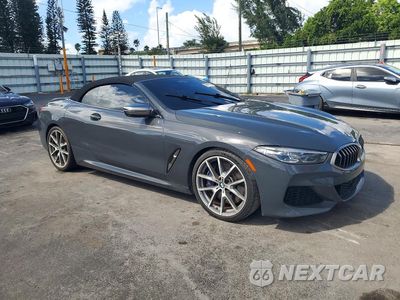 Czwarte zdjęcie samochodu z boku: 2019 BMW M850XI VIN:WBAFY4C55KBJ98709 - miniatura