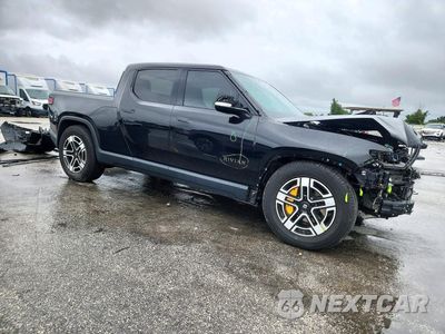 Czwarte zdjęcie samochodu z boku: 2023 RIVIAN R1T ADVENTURE VIN:7FCTGAAA0PN018978 - miniatura