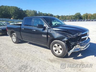 Czwarte zdjęcie samochodu z boku: 2018 RAM 1500 SLT VIN:1C6RR6TT1JS160570 - miniatura