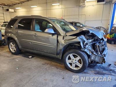 Czwarte zdjęcie samochodu z boku: 2006 CHEVROLET EQUINOX LT VIN:2CNDL73F766034143 - miniatura