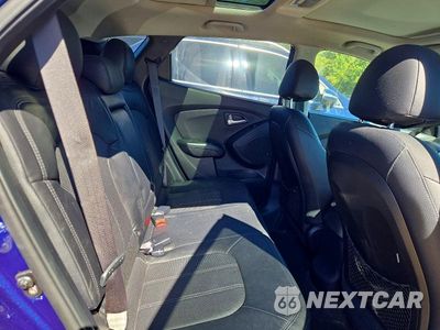 Zdjęcie 11 z 13 samochodu: 2012 HYUNDAI TUCSON LIMITED VIN:KM8JUCAC2CU506599 - miniatura