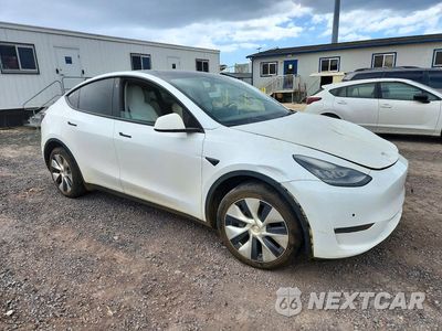 Czwarte zdjęcie samochodu z boku: 2021 TESLA MODEL Y VIN:5YJYGDEE7MF279142 - miniatura