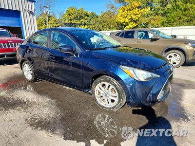 Czwarte zdjęcie samochodu z boku: 2016 SCION IA BASE VIN:3MYDLBZV6GY114623 - miniatura